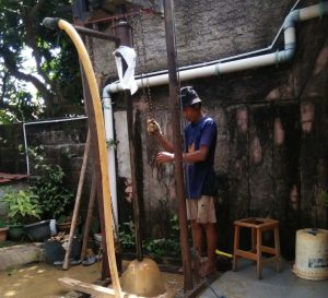 Tukang pompa air di Jakarta Pusat